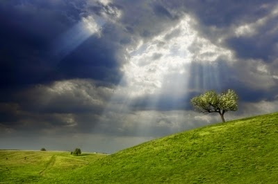 Sun-breaking-thru-storm-clouds-Evgeni-Dinev